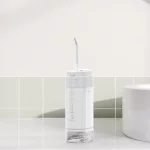 Mini hydropulseur buccal étanche IPX7 pour la maison et les voyages